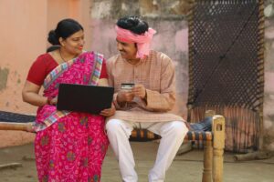 Rural couple making digital payment